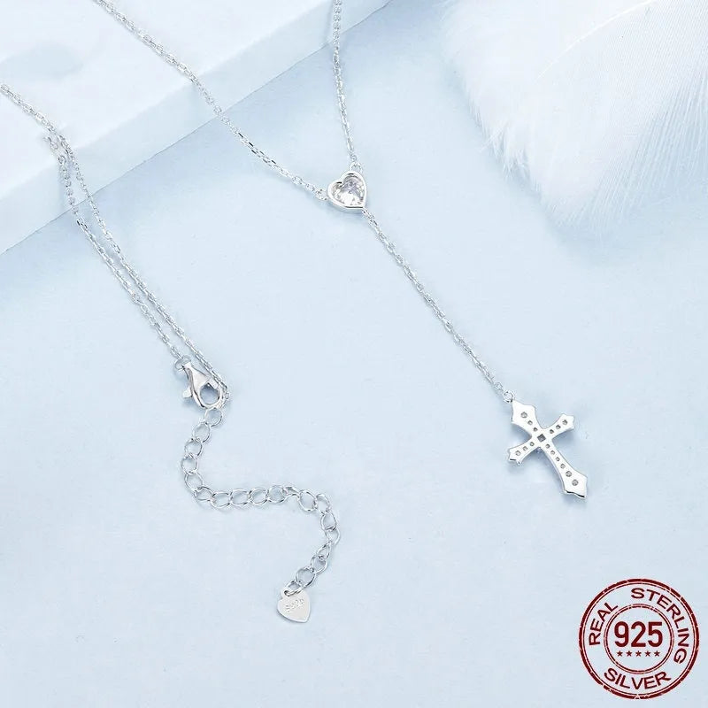 Simple silver cross necklace with V-neck pendant on O-ring chain in colour BSN384