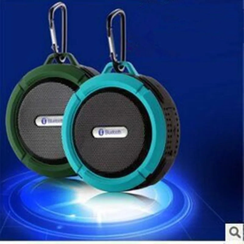 Portable waterproof Bluetooth speaker in multiple colours with bag clip for outdoor use