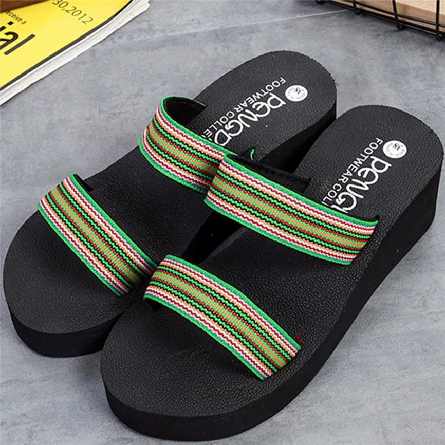 Women's brown bohemian slippers with a wedge heel and elastic ankle strap on a plain background.