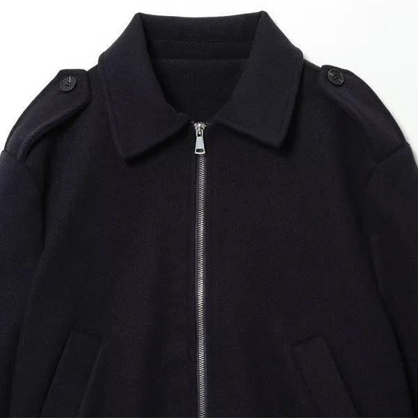 Women's navy blue turn-down collar PU faux leather coat with zipper closure and long sleeves