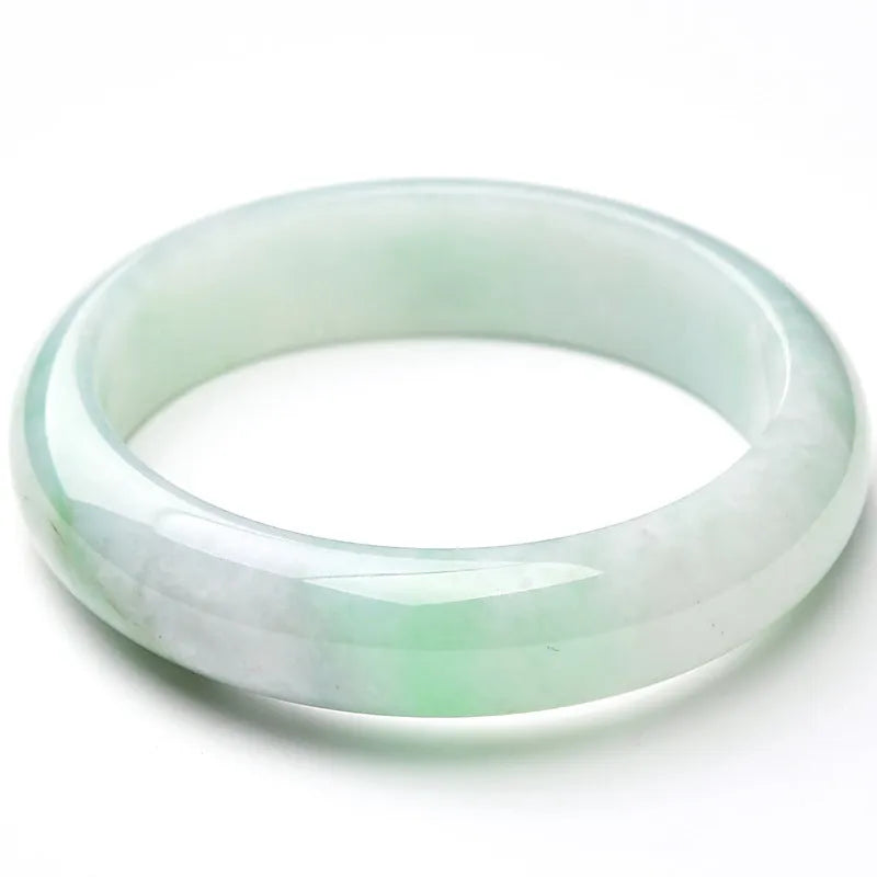 Light green jade bracelet showing natural stone material and simple design for unisex wear