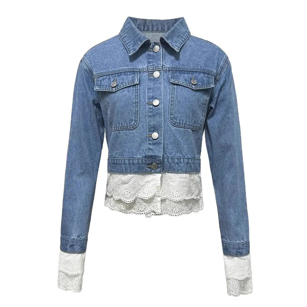 Blue women's denim jacket with decorative lace stitching on the front and sleeves.