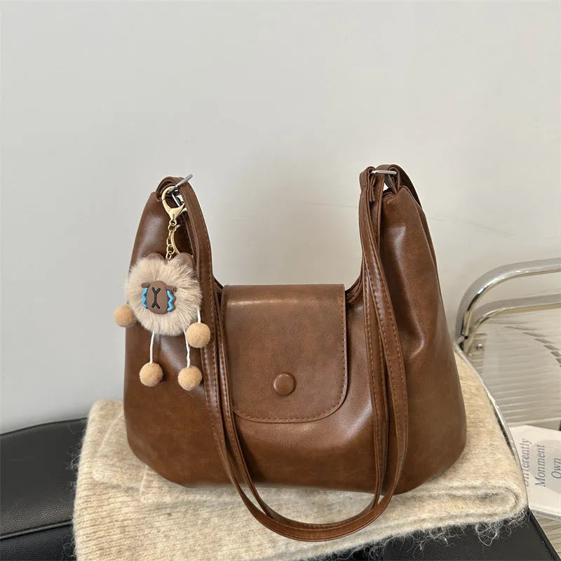 Textured PU leather one-shoulder bag in horizontal square shape with large capacity for daily commuting