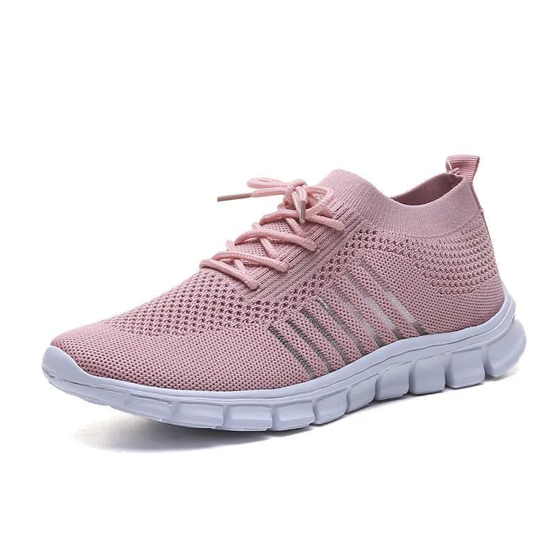 Women's casual breathable flying knit flat shoes in various colours on a white background.