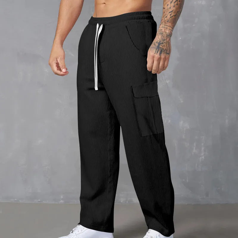Men's corduroy cargo trousers in straight wide-leg design with drawstring waist