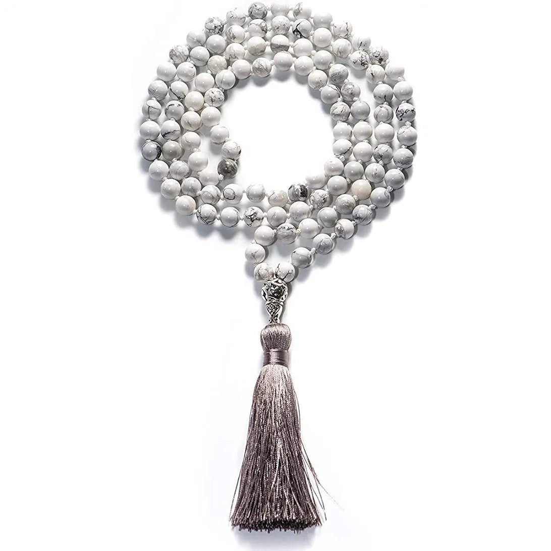 Agate tassel necklace with geometric pattern featuring multiple colourful stones including amethyst and lapis lazuli