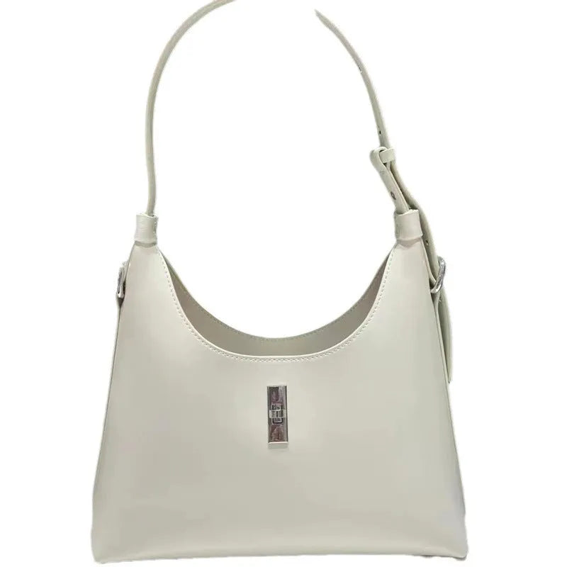 Genuine leather dumpling-shaped crossbody bag in apricot colour with an outer sandwich pocket