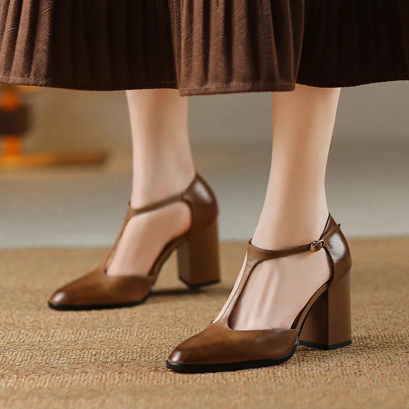 Women's pink retro Mary Jane shoes with a pointed toe, buckle strap, and cowhide leather upper.