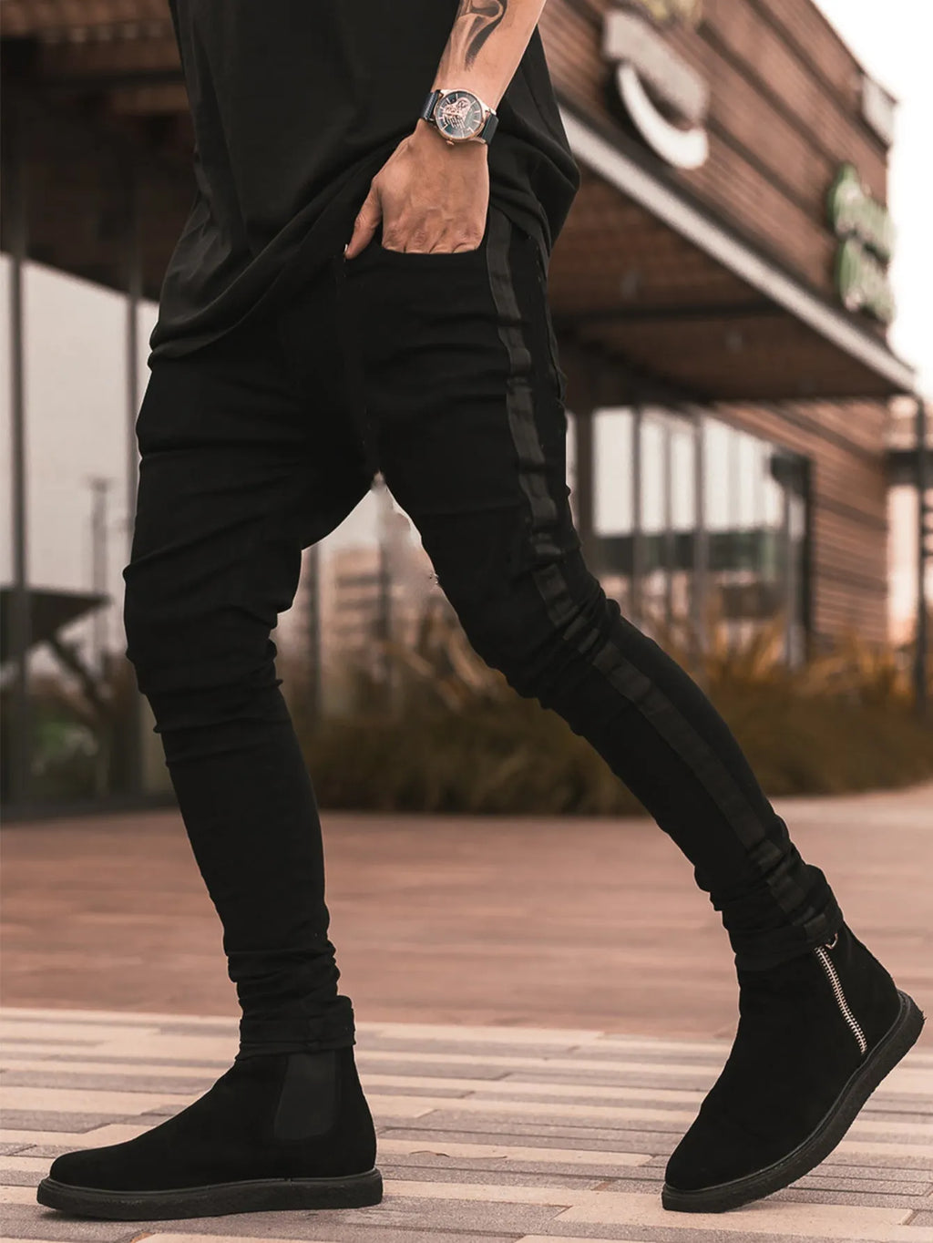 Men's ripped black slim-fit high waist cotton denim trousers with elastic waist