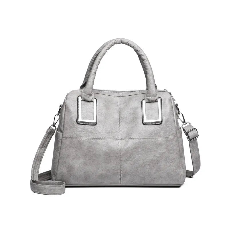 Women's square shoulder bag in wear-resistant material with internal organisers