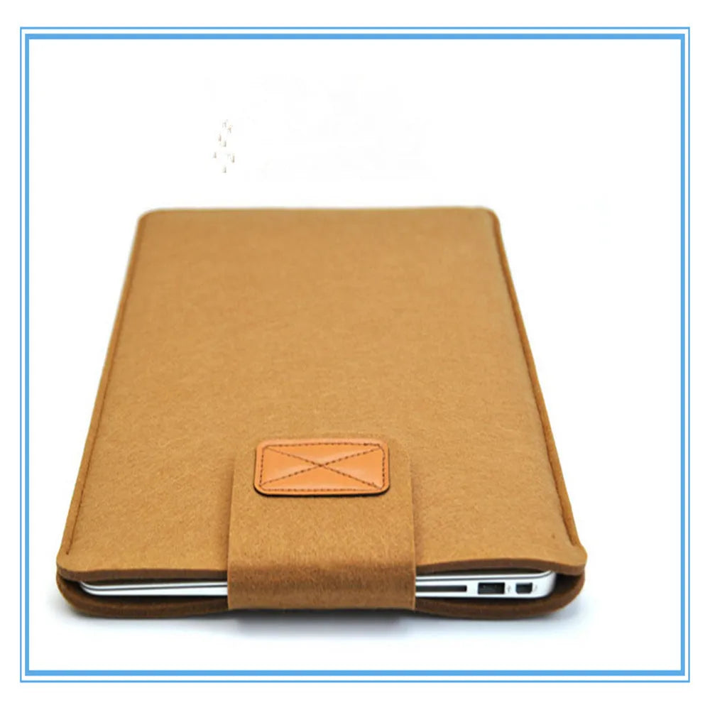 Khaki clamshell laptop bag open to show plush interior and corner protectors for tablet and notebook