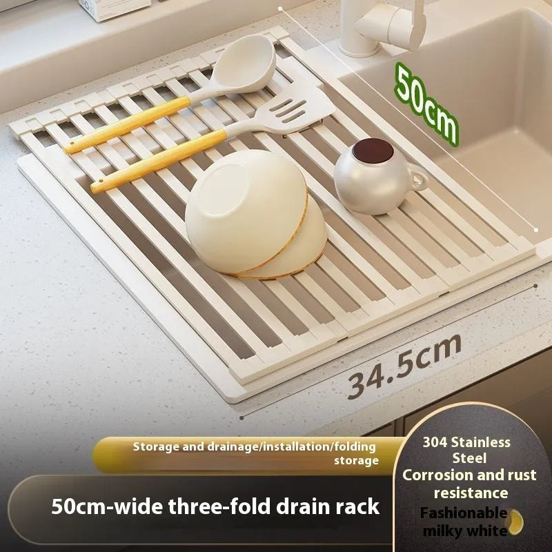 Milky white foldable stainless steel kitchen draining rack shown over a sink.