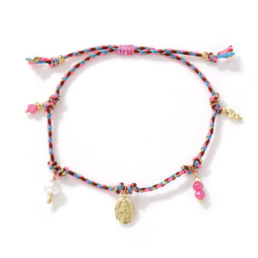 Close-up of a colourful hand-woven braided rope bracelet for women in ethnic style.
