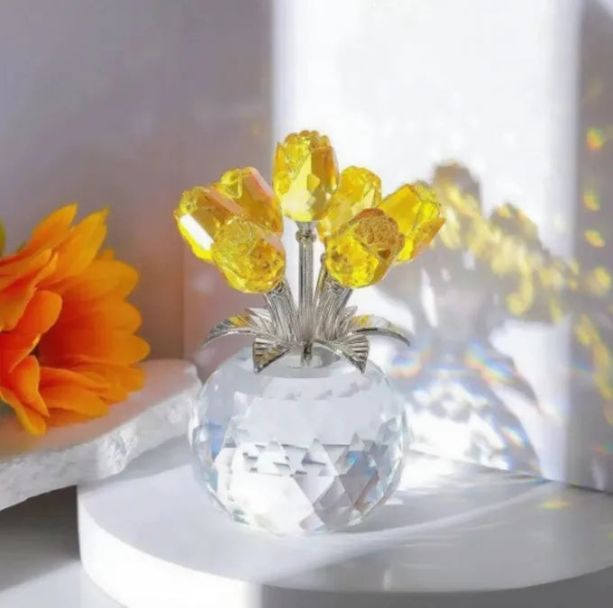 Handmade K9 crystal glass rose ornament in geometric Chinese style on a table.