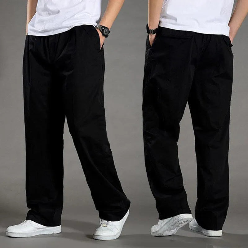 Men's cotton loose straight trousers zip placket workwear style, black colour, on model