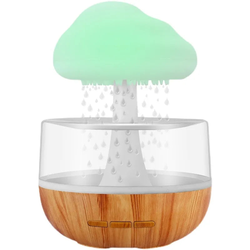 White cloud-shaped humidifier with coloured lights and water droplets