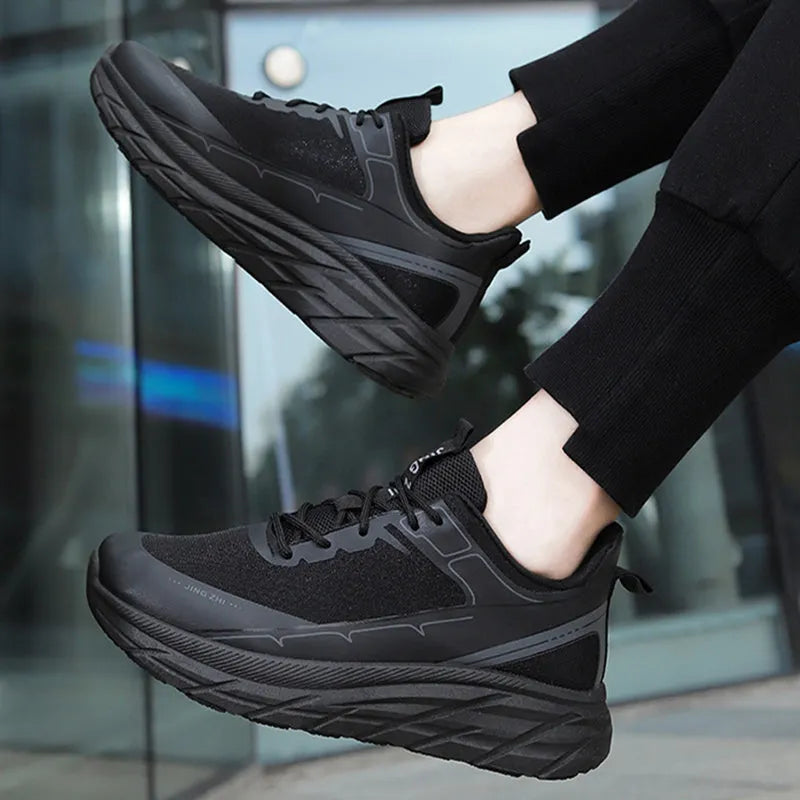 Mens thick-soled anti-skid lace-up running sneakers with rubber sole in black and grey colour options