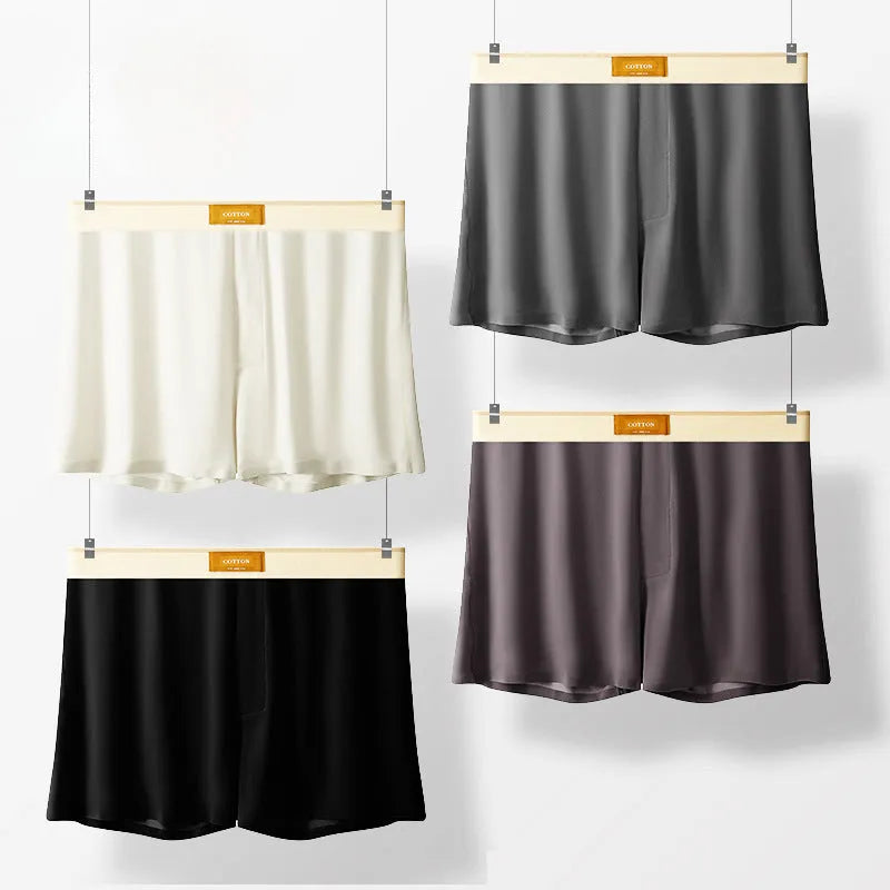 Men's solid colour loose Ice Silk underwear briefs on a neutral background