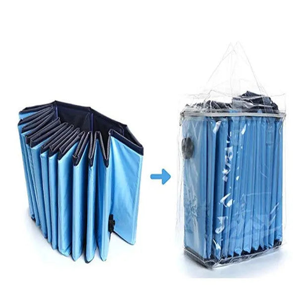 Foldable blue dog swimming pool with thickened PVC material and quick drain valve, set up on grass