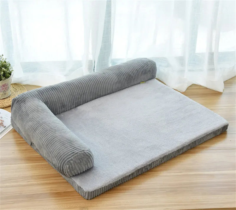 Corduroy pet sofa dog bed with raised edges in coffee colour showing reversible bilateral design
