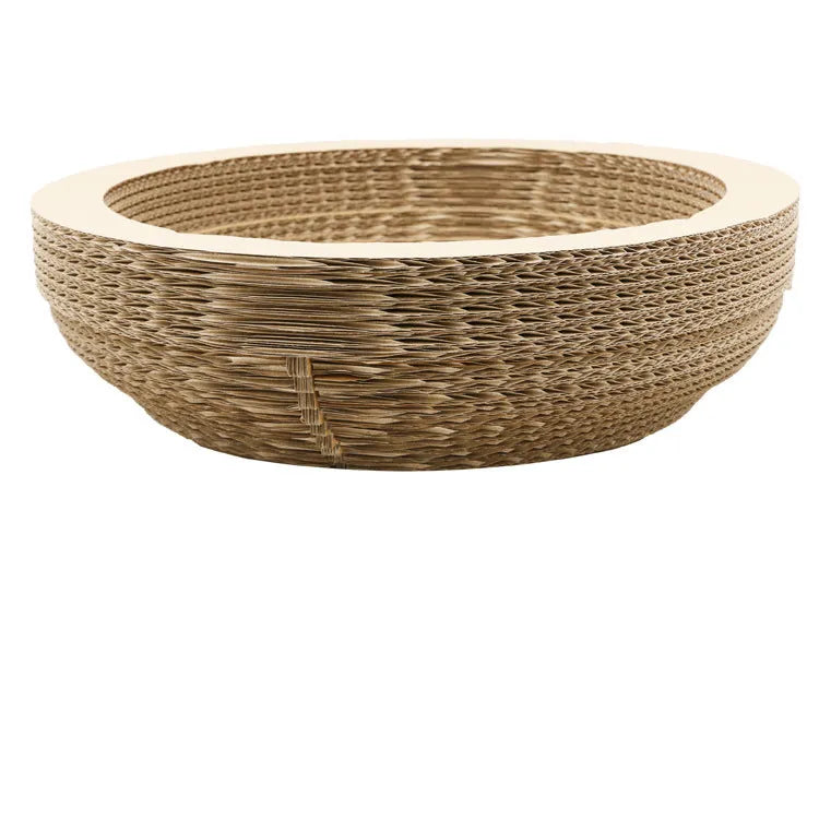 Brown paper cat scratch board 40cm diameter on floor with cat scratching