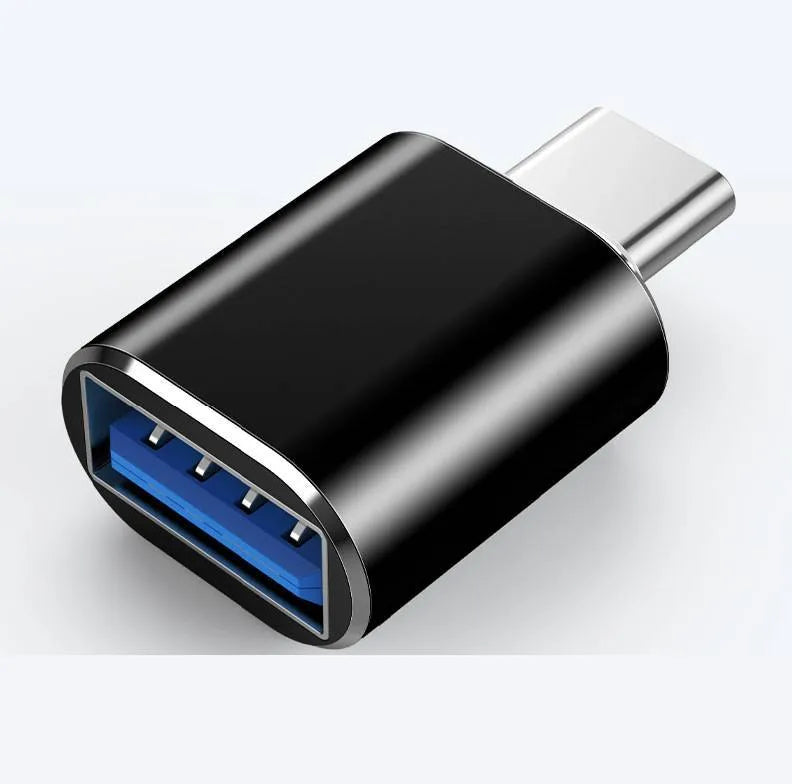 USB-C to USB-A OTG adapter shown in black, gold, and silver colour options.