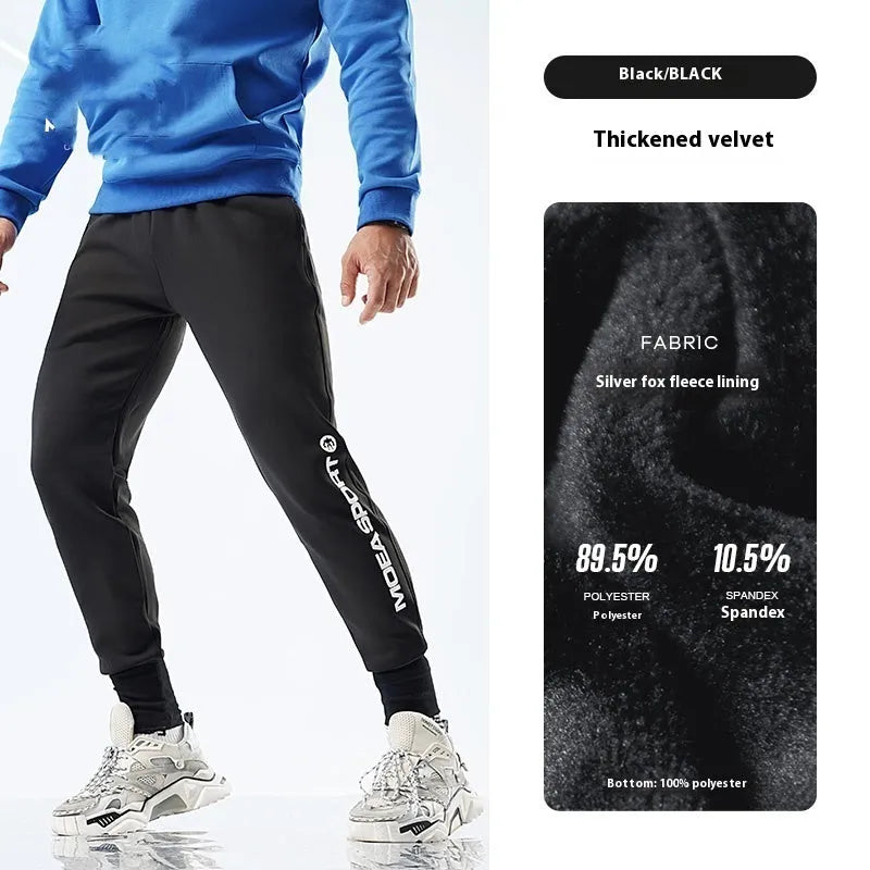 Men's black air layer sweatpants with elasticated ankle cuffs and tapered fit for sports