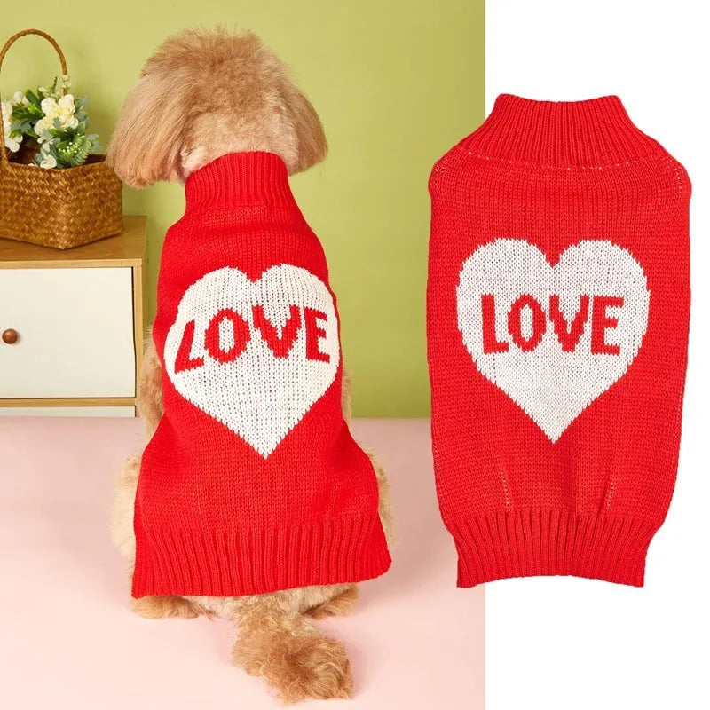 Dog wearing red love heart patterned sweater in acrylic knit fabric