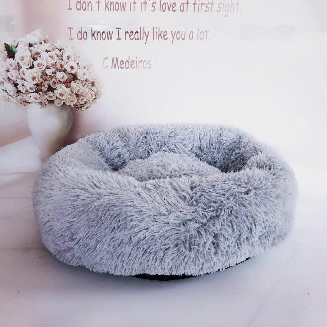 Round PV plush pet bed with raised rim in khaki colour for dogs and cats