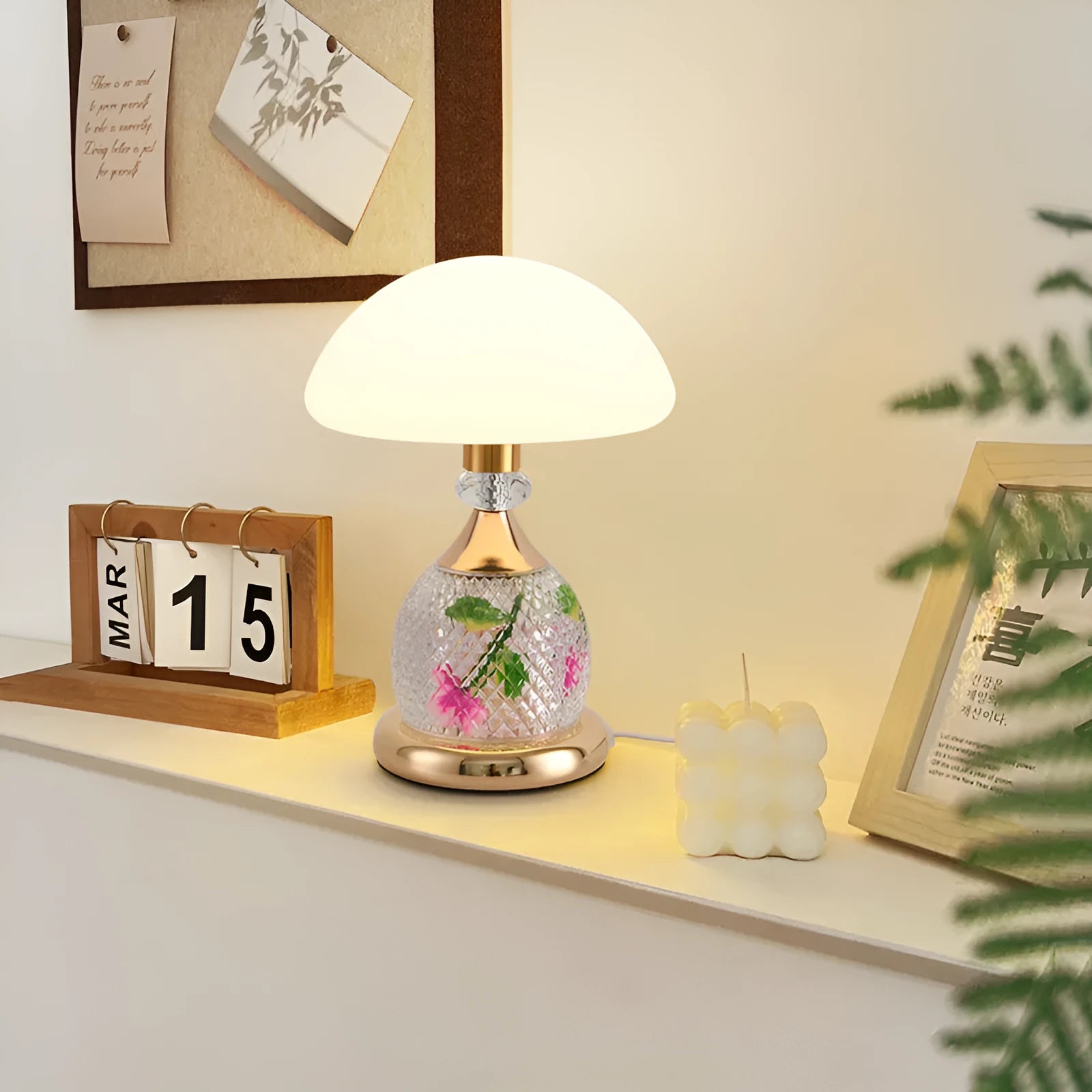 Light luxury mushroom table lamp with carved base in transparent colour on a wooden bedside table