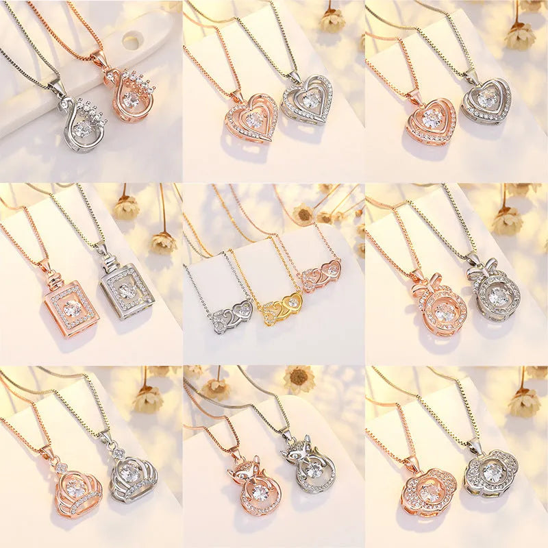 Sterling silver heart necklace with crown and bow charm detail in rose gold or silver finish