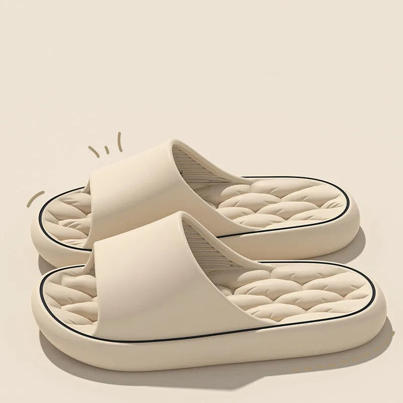 Non-slip EVA bathroom slippers with thick sole and hollow upper in grey, side view