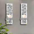 Pair of silver mirror glass candlestick holders mounted on wall for modern home decoration
