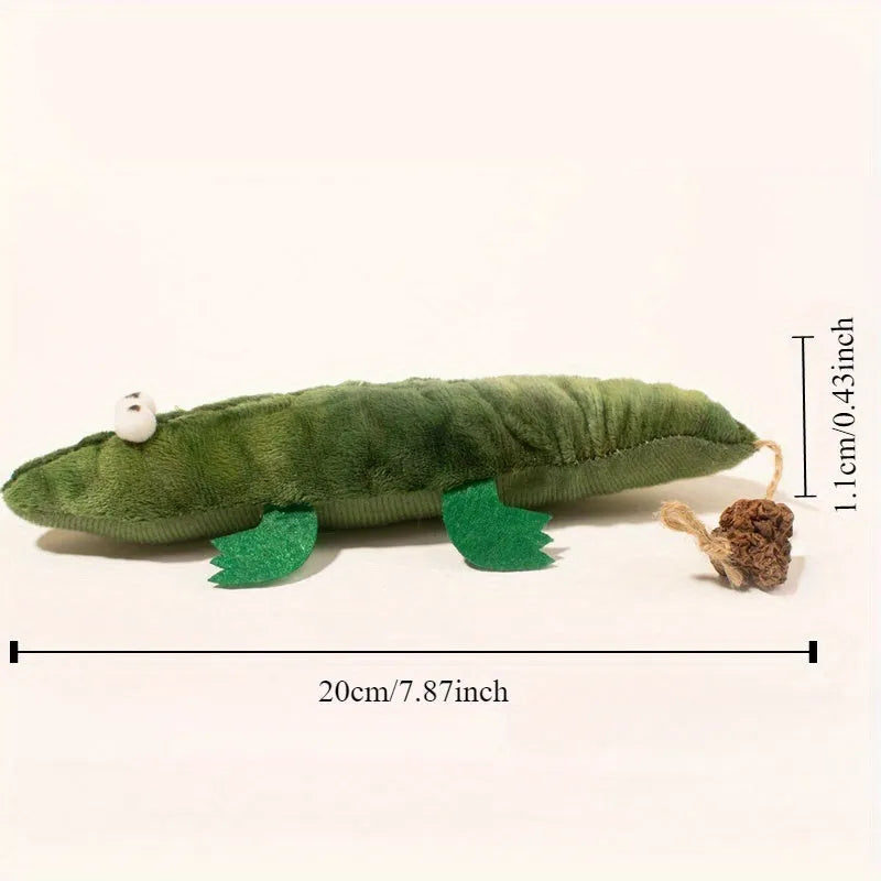 Green plush alligator catnip toy with peppermint scent for feline oral care and play