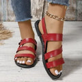Fashion round toe beige Roman women's sandals with PU upper and rubber sole on a neutral background