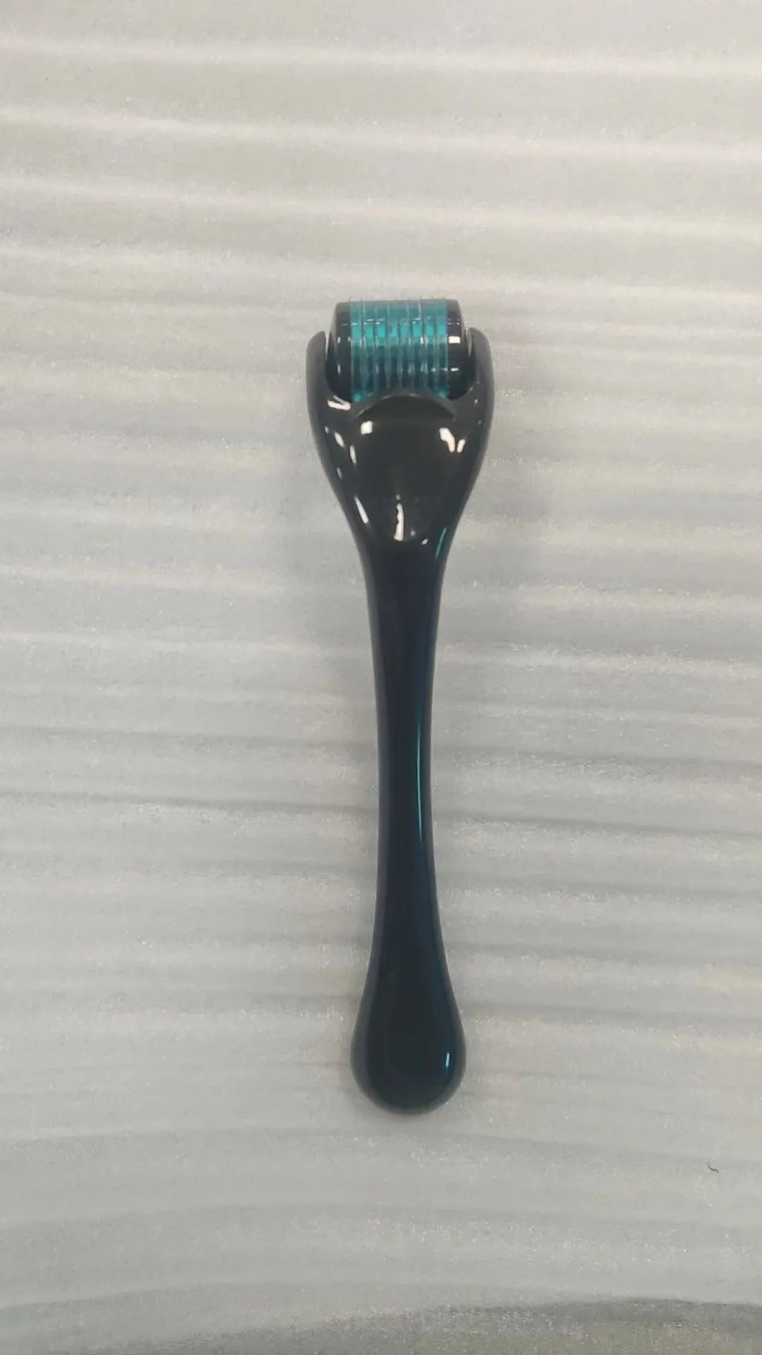540 micro needle derma roller tool with black handle and purple wheel for 0.2mm 0.25mm 0.3mm cartridges.