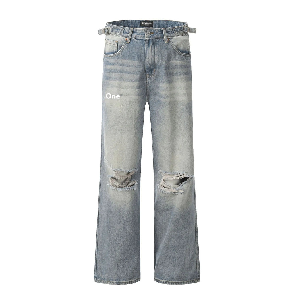 Denim blue straight-leg jeans with ripped details and zip fly closure