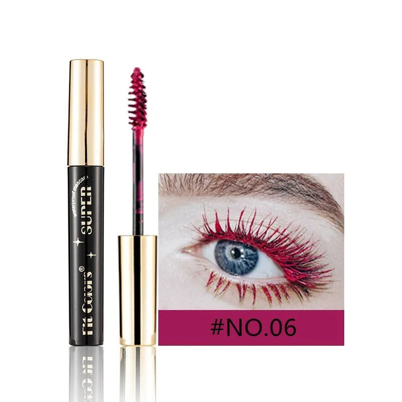 Colourful mascara tube and wand with vibrant shades for dramatic Christmas and stage eye makeup.