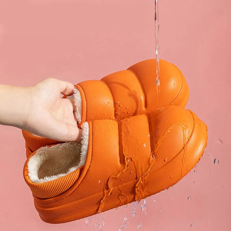 Women's waterproof EVA garden slippers in green, showing overshoe design with plush lining and non-slip sole.