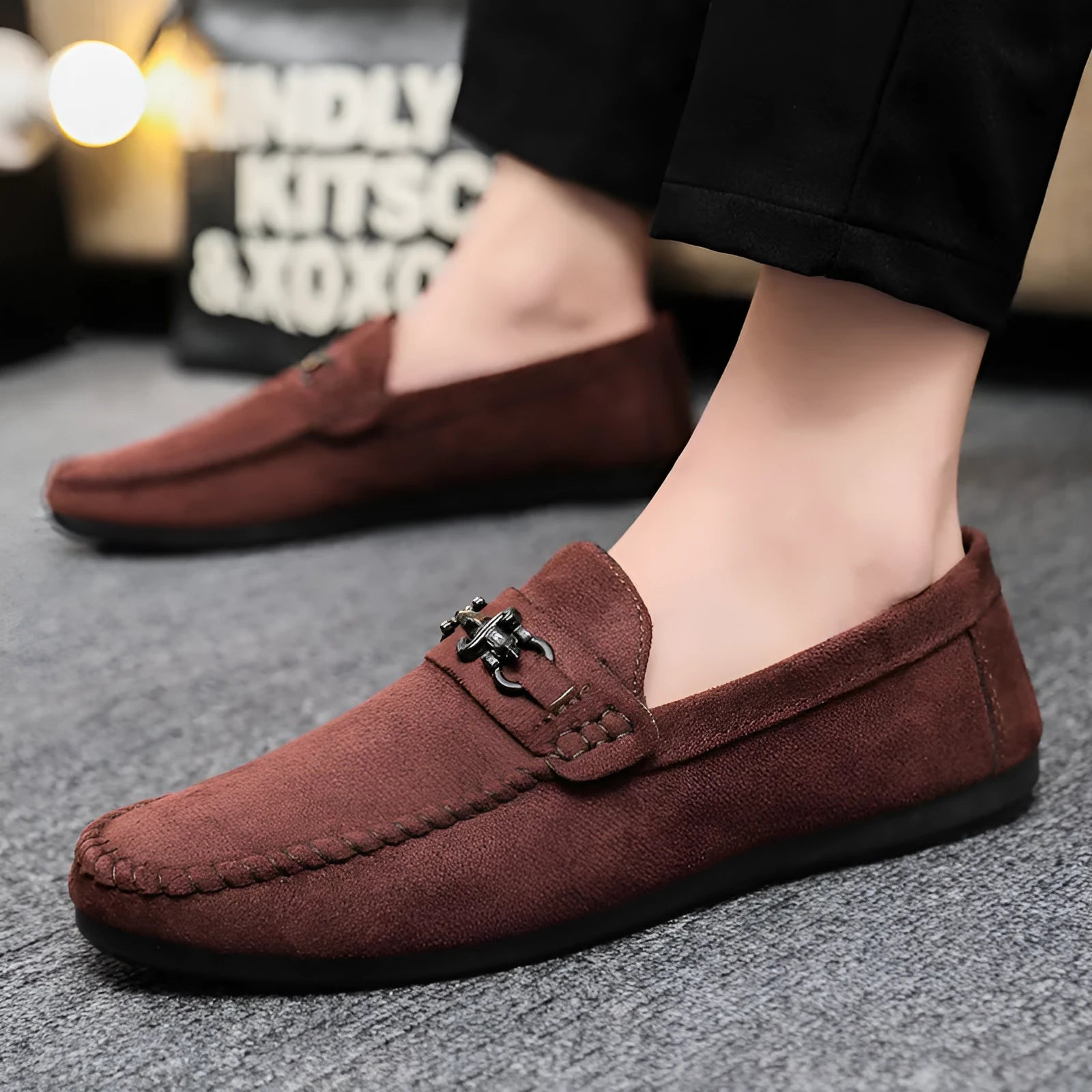 Men's black waterproof PU slip-on loafers with a round toe and low stiletto heel on a rubber sole.