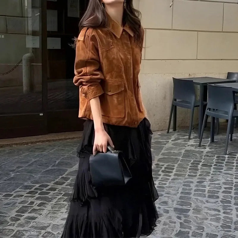Brown polyester suede coat with regular sleeves on a hanger