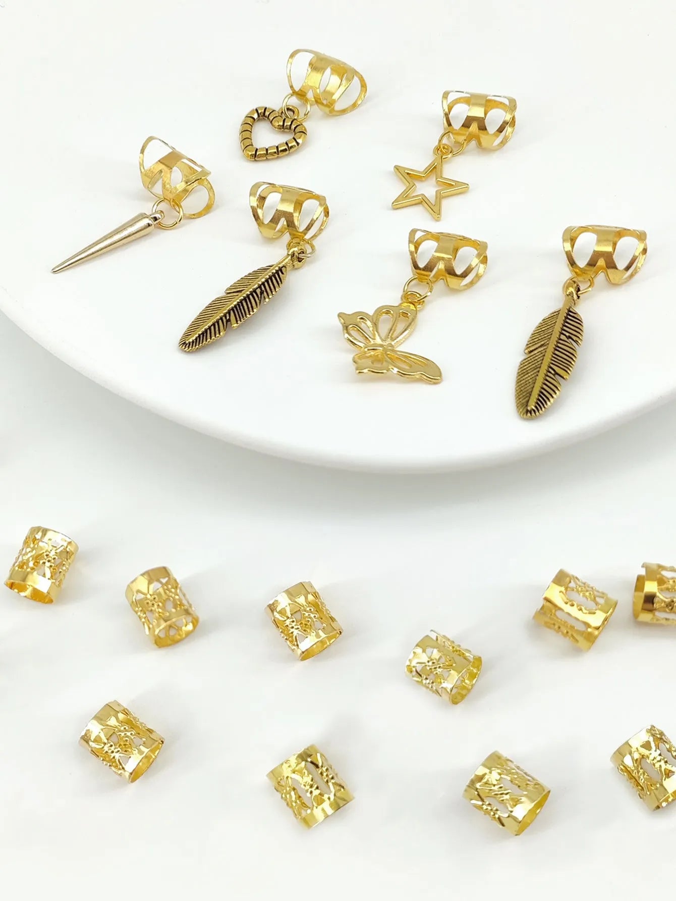 Pack of 26 antique-style hair rings with leaves and braid design in gold or silver electroplated finish