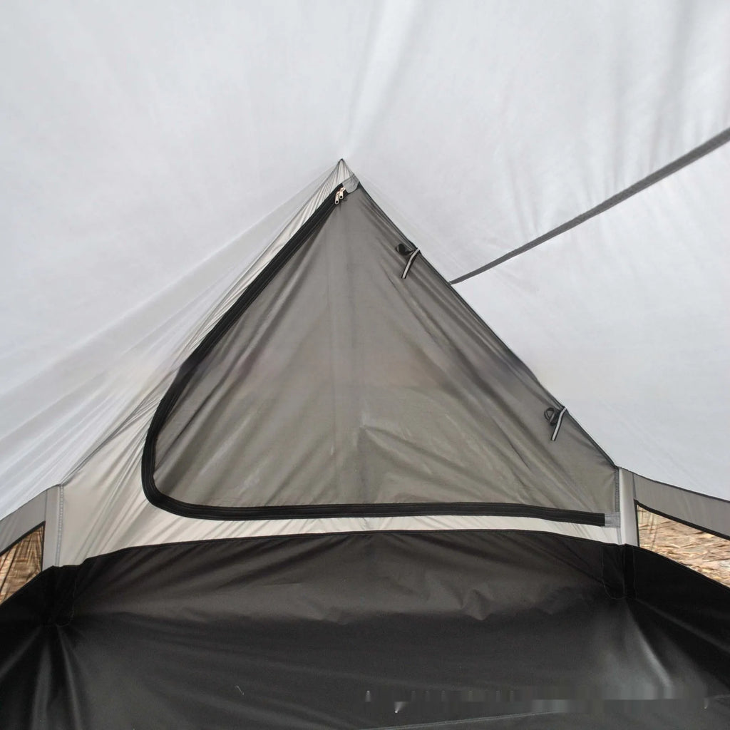 Brown or white A-line hiking tent pitched using hiking canes, showing spacious interior for 2-3 people.