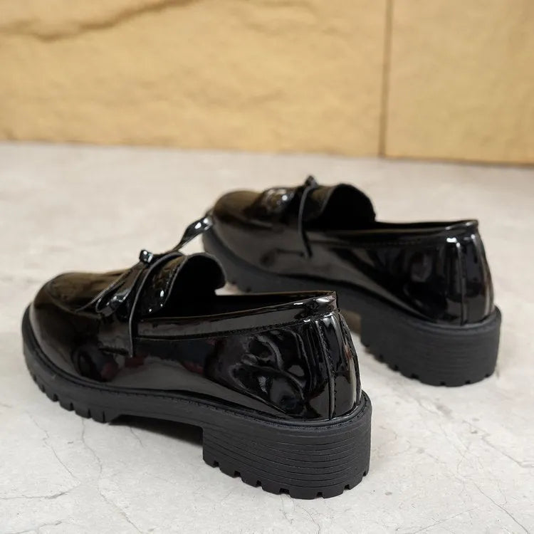Women's brown loafers with decorative bow on artificial PU leather upper
