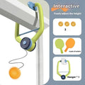 Children's table tennis ball trainer with door frame clip and three balls on elastic cords for indoor practice