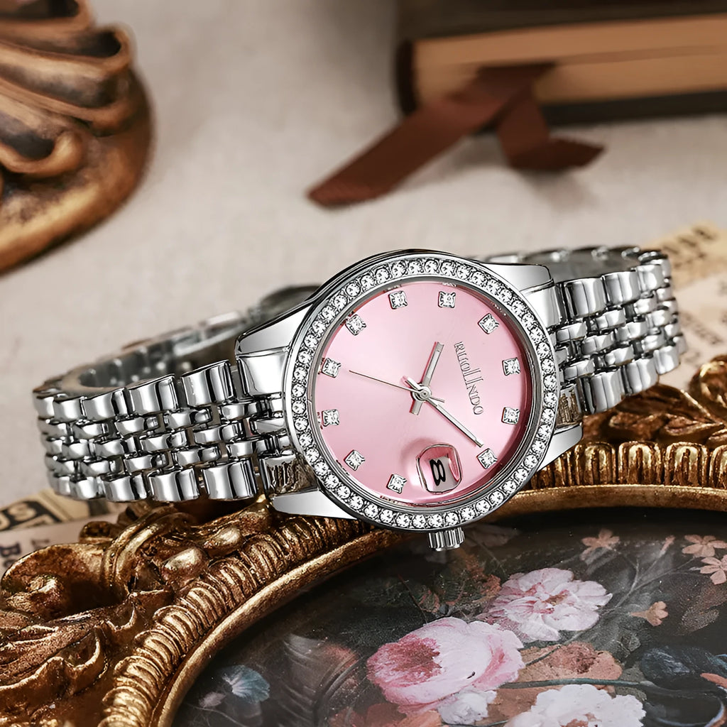 Women's silver calendar watch with circular dial showing date function and stainless steel buckle