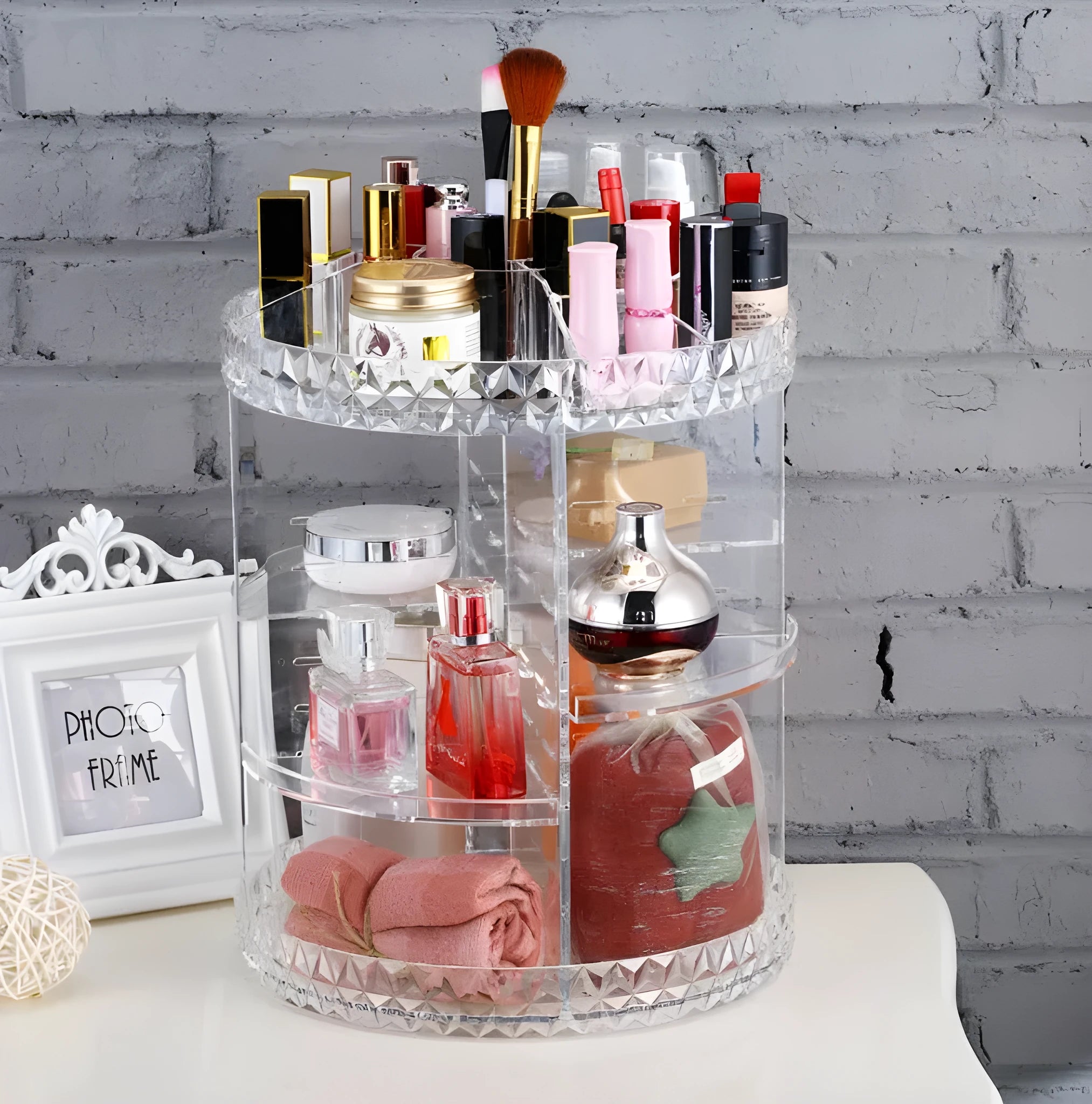 Diamond wave 360 rotating acrylic makeup organiser with detachable compartments on a vanity table
