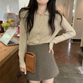 Women's beige loose-fit long-sleeved viscose knitted cardigan shown open as a layering piece.
