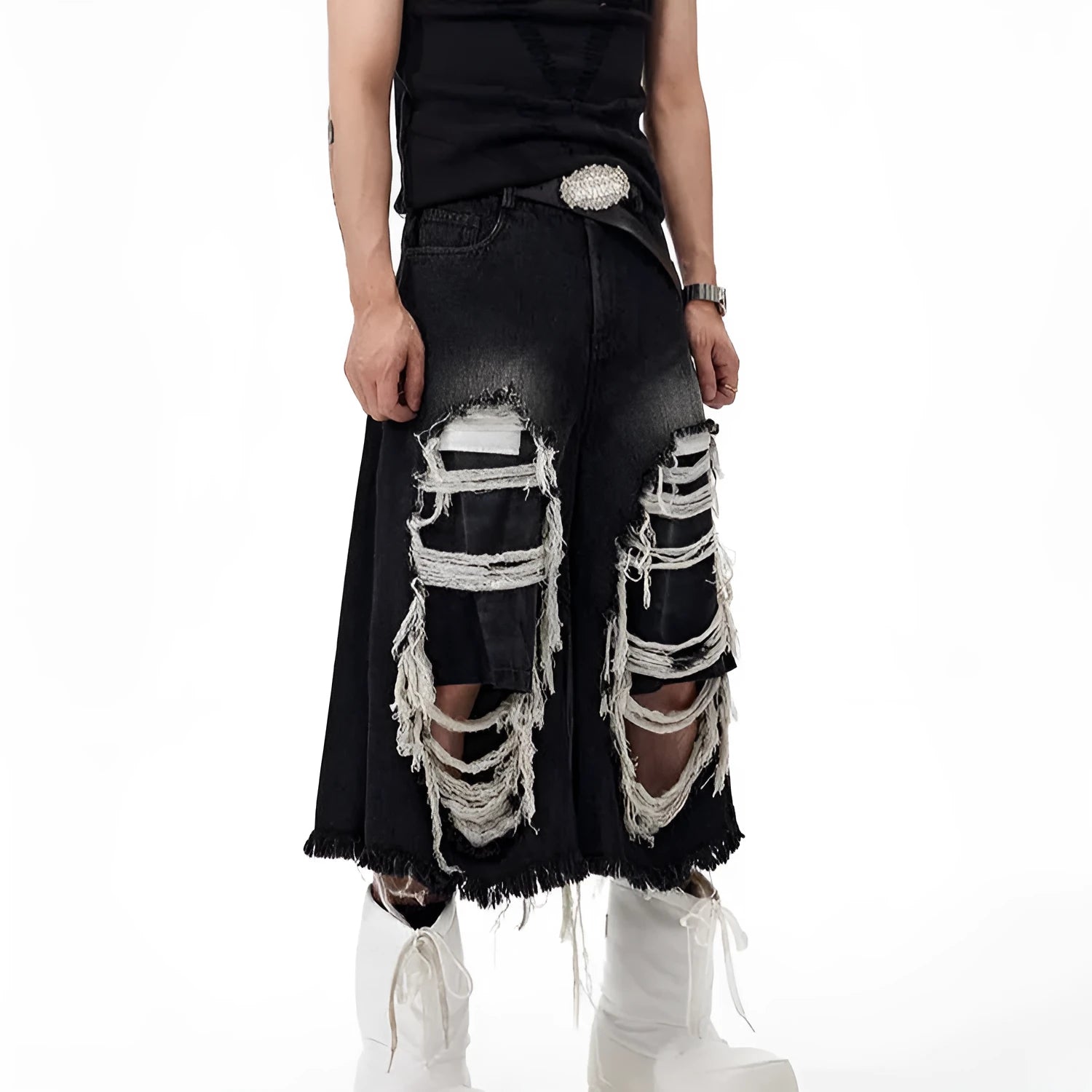 Black women's cropped wide leg jeans with distressed patches and a mid-high waist.