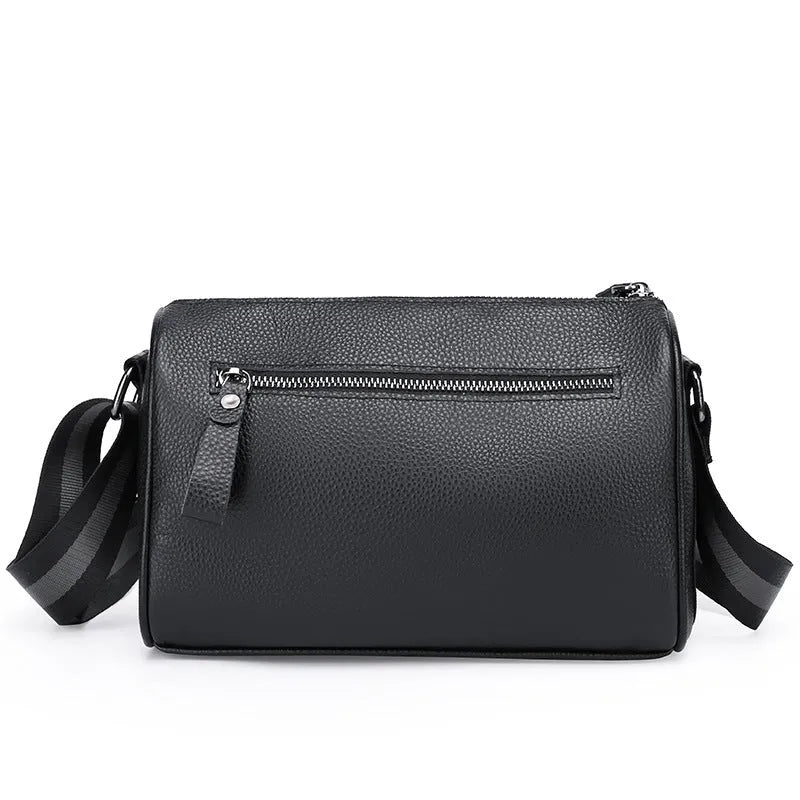Black genuine leather crossbody bag with dimensions 24cm wide by 16cm high by 13cm deep